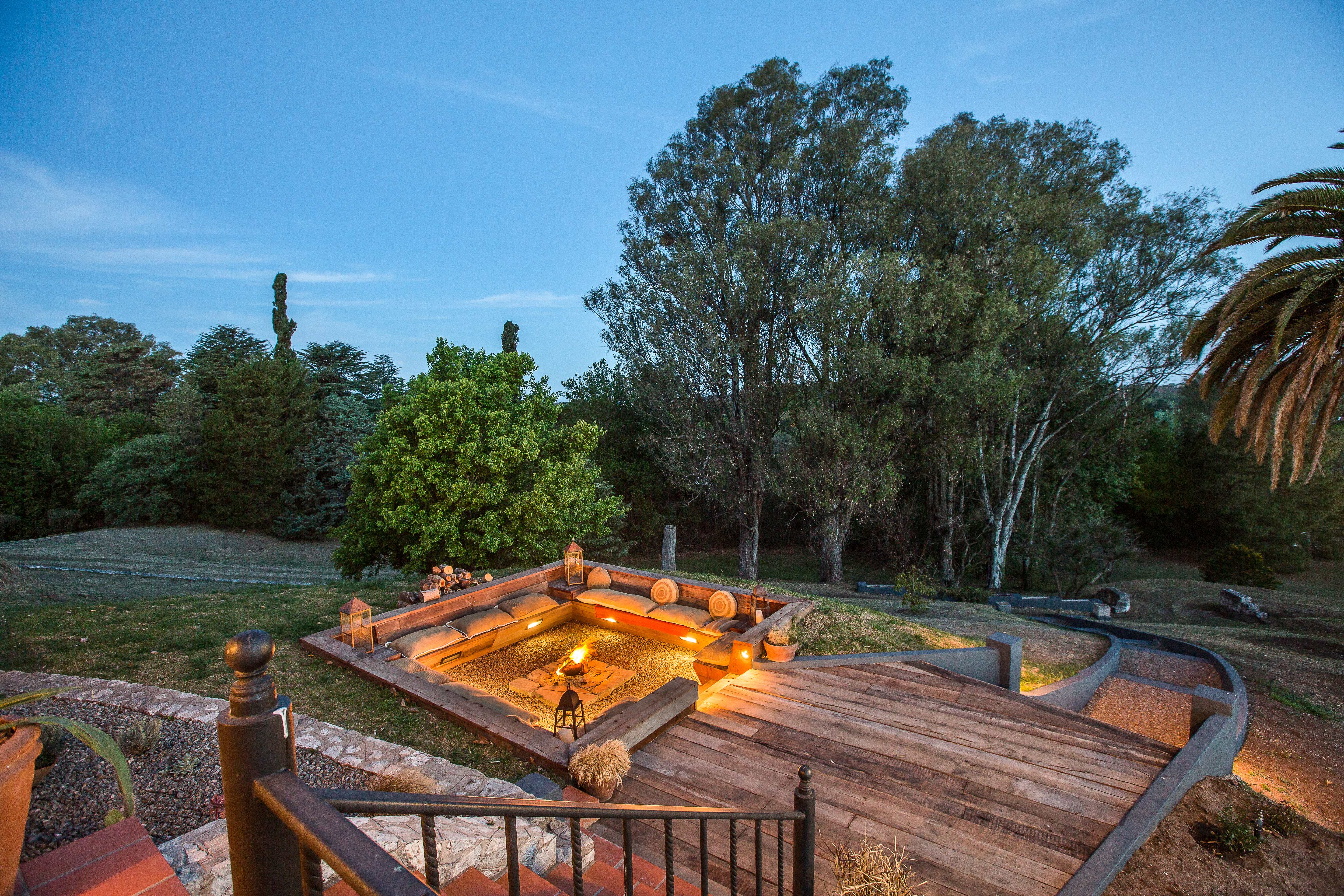 Outdoor fire pit area at sunset