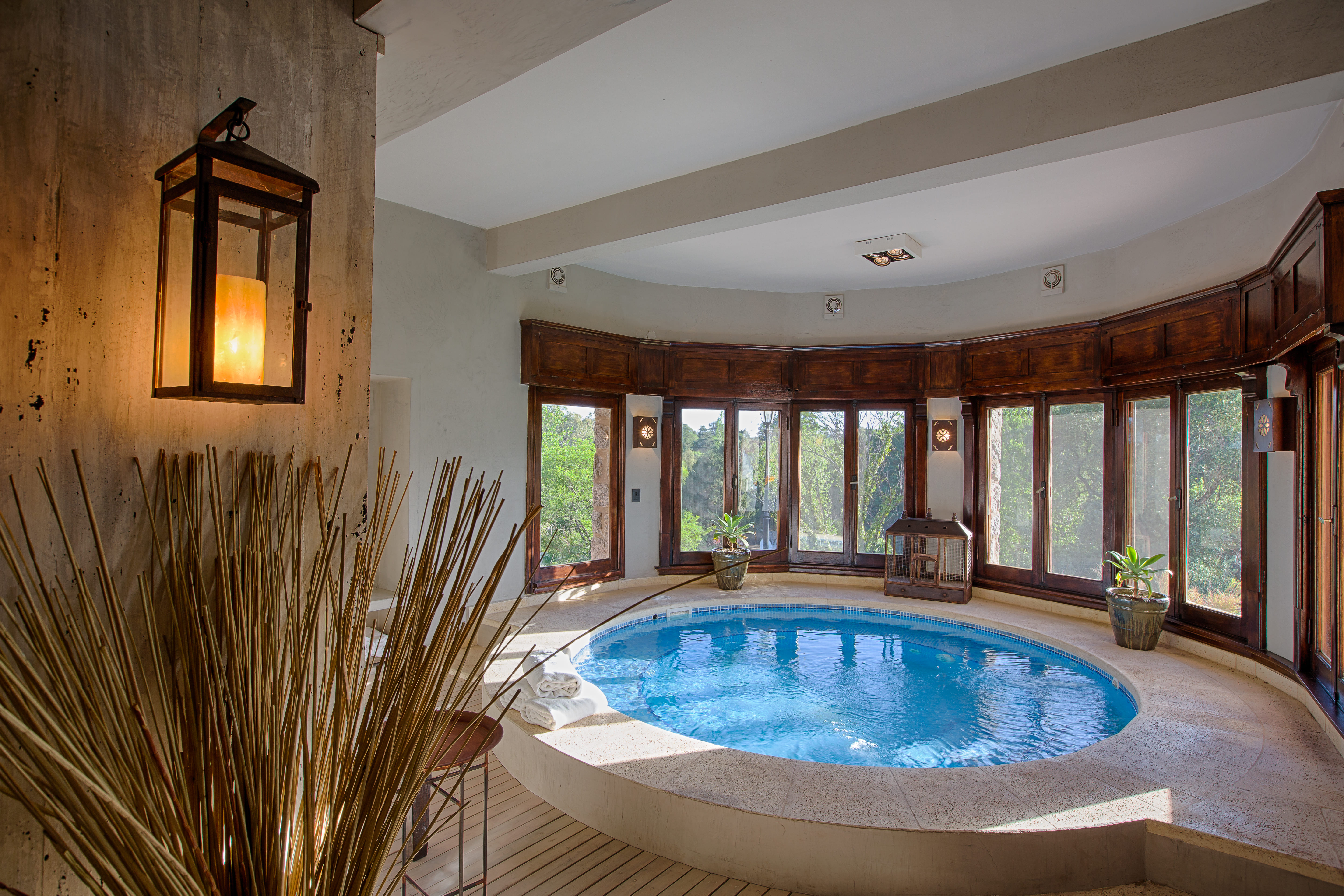 Indoor spa sanctuary with circular jacuzzi